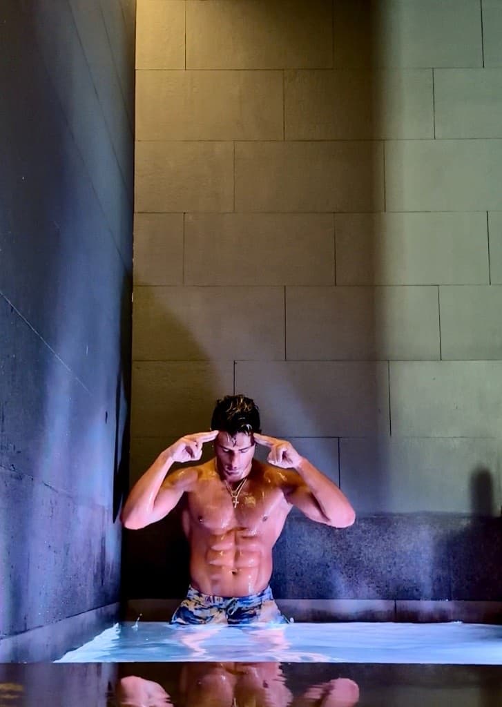 Gaurav Nandipura in cold plunge recovery with focused mindset pose
